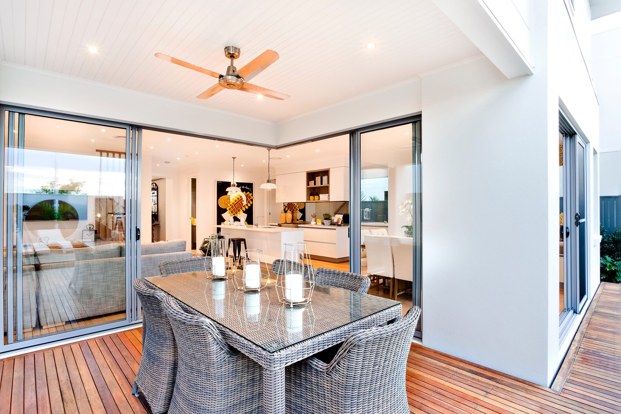 Patio with sliding patio doors in corner with patio dining room wicker furniture